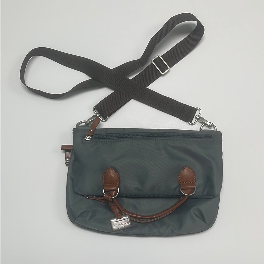 Steel Grey TRAVELON “twenty9five” PIEGARE multi pocket RFID X-body bag, NWOT